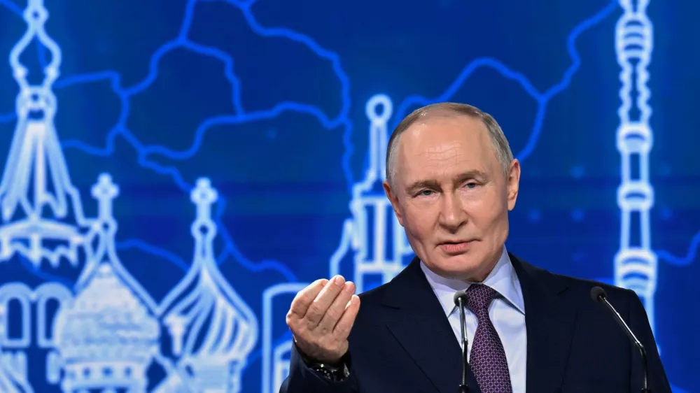 Russian President Vladimir Putin gestures during the annual congress of the Russian Union of Industrialists and Entrepreneurs in Moscow, Russia, Thursday, March 26, 2026. (Yury Kochetkov, Sputnik, Kremlin Pool Photo via AP)