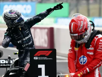 Formula One F1 - Japanese Grand Prix - Suzuka Circuit, Suzuka, Japan - March 29, 2026 Mercedes' Andrea Kimi Antonelli celebrates winning the Japanese Grand Prix REUTERS/Jakub Porzycki