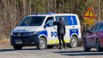 A Police car blocks the Savistontie road after two unidentified drones entered and landed in Finnish territory, in Kouvola, Finland, Sunday, March 29, 2026 (Sasu Järnstedt/Lehtikuva via AP)