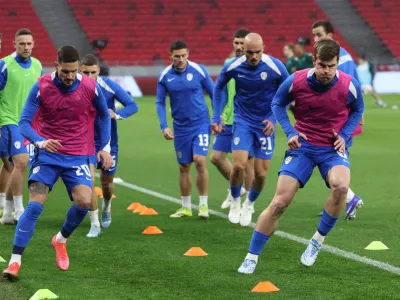 Soccer Football - International Friendly - Hungary v Slovenia - Puskas Arena, Budapest, Hungary - March 28, 2026 Slovenia players during the warm up before the match REUTERS/Bernadett Szabo