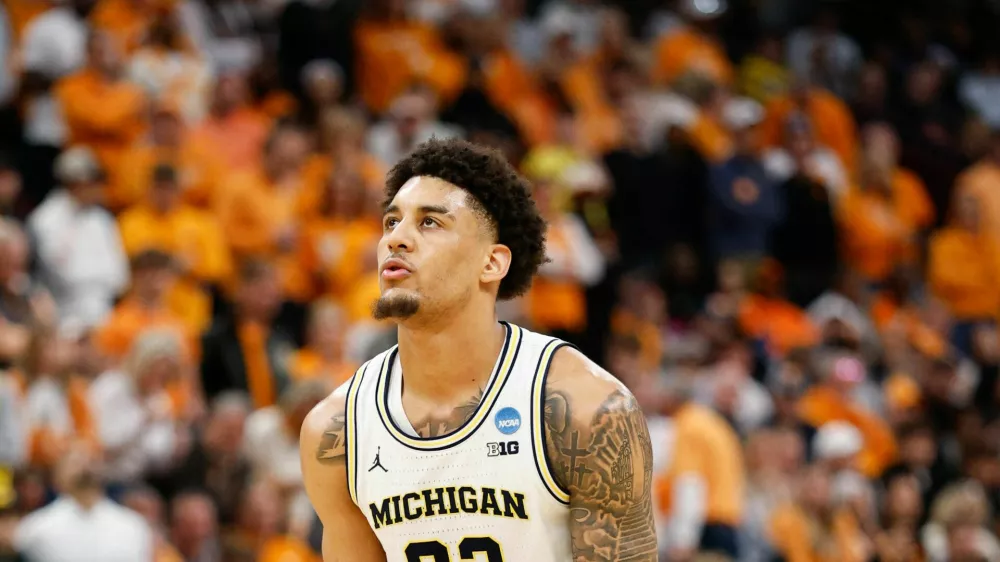 Mar 29, 2026; Chicago, IL, USA; Michigan Wolverines forward Yaxel Lendeborg (23) shoots a free throw in the second half against the Tennessee Volunteers during an Elite Eight game of the Midwest Regional of the men's 2026 NCAA Tournament at United Center. Mandatory Credit: Kamil Krzaczynski-Imagn Images