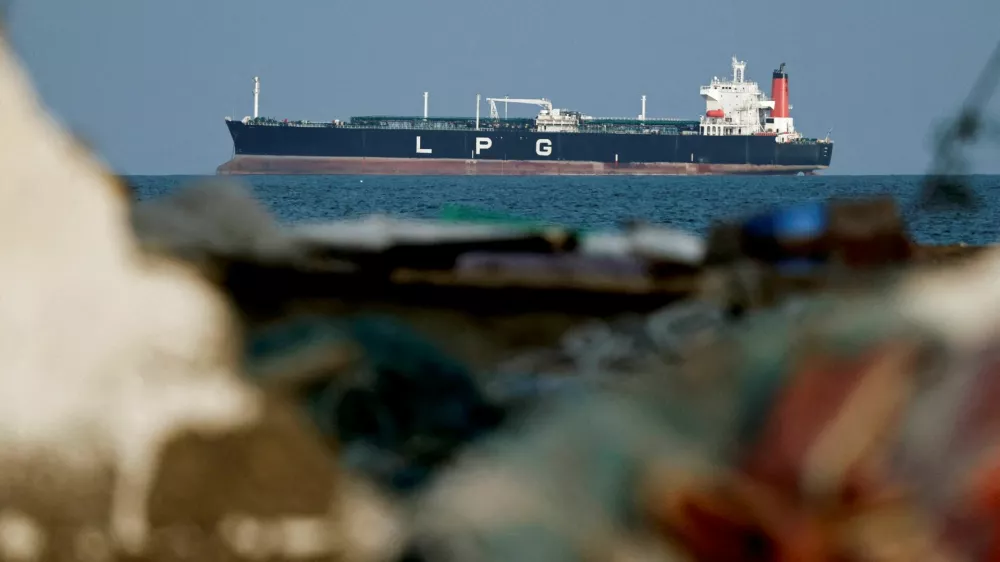 FILE PHOTO: An LPG gas tanker at anchor as traffic is down in the Strait of Hormuz, amid the U.S.-Israeli conflict with Iran, in Shinas, Oman, March 11, 2026. REUTERS/Benoit Tessier/File Photo