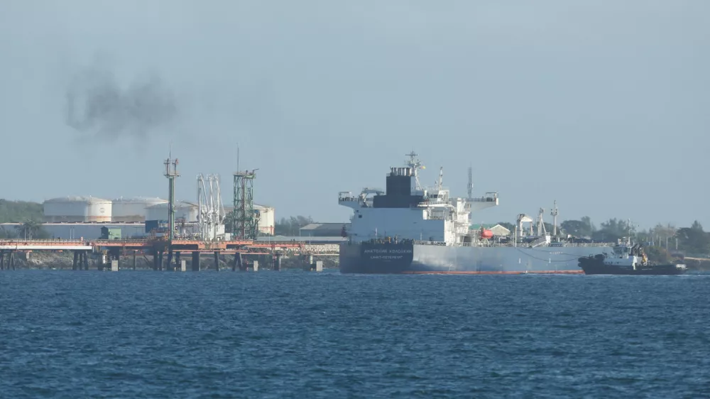 Russian-flagged oil tanker Anatoly Kolodkin manoeuvres at the Matanzas bay, Cuba, whose economy has ground to a halt under a de facto oil blockade imposed by Washington resulting in an energy crisis that has led to strict gasoline rationing and a series of blackouts across the country of 10 million people, March 31, 2026. REUTERS/Norlys Perez