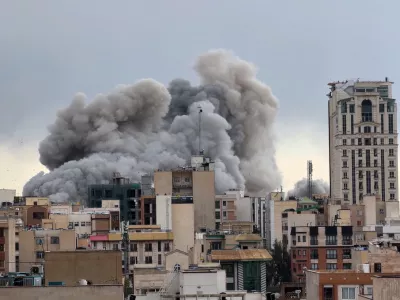 FILE - A plume of smoke rises after a strike in Tehran, Iran, March 2, 2026. (AP Photo/Mohsen Ganji, File)
