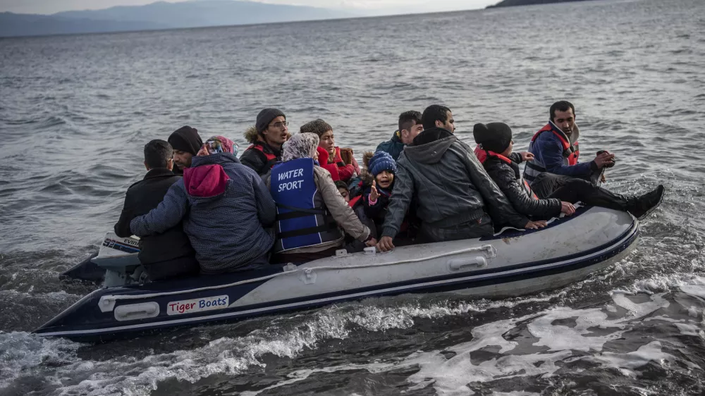 FILED - 28 February 2020, Greece, Lesbos: Refugees in a lifeboat arrive on the Greek island of Lesbos after crossing the Aegean Sea with other migrants from Turkey. A passing freighter rescued 68 migrants whose boat was in distress off the Greek island of Kalymnos on Monday morning, Greek media reported. Photo: Angelos Tzortzinis/dpa