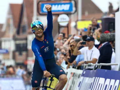 19 September 2021, Belgium, Bruges: Italian cyclist Filippo Ganna of Ineos Grenadiers celebrates winning the men elite time trial race, 43.3 km from Knokke-Heist to Brugge, at the 2021 UCI Road World Championships. Photo: Kurt Desplenter/BELGA/dpa