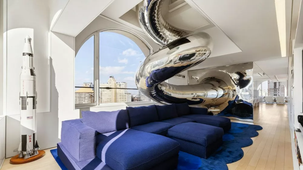 EXCLUSIVE: Story from Jam Press (Insane Sky House)'Sky house' with multi-floor SLIDE and indoor climbing wall goes on sale for 0mA one-of-a-kind "sky house" perched on top of a 23-storey skyscraper has hit the market for a staggering 0m.The jaw-dropping home crowns a historic building at 150 Nassau Street in New York and spans the top four floors.Inside, the 6,500 sq ft property is packed with quirky features, including a giant spiral slide running through the home.The stainless steel slide starts at the very top and winds its way down two floors before ending in the main living space.There is even an indoor climbing wall and rope swing at the heart of the property, as reported by creatorzine.com.The open-plan living area boasts soaring ceilings of up to 46ft and massive arched windows with sweeping views across the New York skyline and rivers.A large terrace also offers stunning panoramic views across the city.Elsewhere, the luxury home features multiple bedrooms, a high-end kitchen fitted with top-of-the-range appliances and a separate prep kitchen.There are also wine fridges, a laundry room and several bathrooms, including a spa-style main bathroom complete with a steam shower and heated floors.The upper level, currently used as a gym, includes the top of the climbing wall and access to the slide.The building itself dates back to 1895 and is considered one of New York's earliest steel-frame skyscrapers.Known as the "Sky House", the property was designed by architect David Hotson and interior designer Ghislaine Vińas.It has previously won major design awards and has been described as a unique architectural masterpiece.The incredible home is now up for sale with a price tag of 0m.ENDS.26 Mar 2026Pictured: Story from Jam Press (Insane Sky House)Pictured: The one-of-a-kind "sky house".'Sky house' with multi-floor SLIDE and indoor climbing wall goes on sale for 0mA one-of-a-kind "sky house" perched on top of a 23-storey skyscraper has hit the market for a staggering 0m.The jaw-dropping home crowns a historic building at 150 Nassau Street in New York and spans the top four floors.Inside, the 6,500 sq ft property is packed with quirky features, including a giant spiral slide running through the home.The stainless steel slide starts at the very top and winds its way down two floors before ending in the main living space.There is even an indoor climbing wall and rope swing at the heart of the property, as reported by creatorzine.com.The open-plan living area boasts soaring ceilings of up to 46ft and massive arched windows with sweeping views across the New York skyline and rivers.A large terrace also offers stunning panoramic views across the city.Elsewhere, the luxury home.,Image: 1086414306, License: Rights-managed, Restrictions: NO Australia, Germany, Norway, South Korea, Sweden, United Kingdom, United States, Unknown Country, Model Release: no, Pictured: Floorplan
