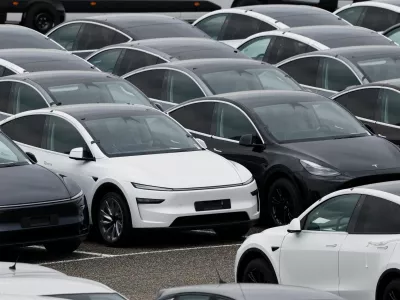 FILE PHOTO: Tesla electric vehicles are pictured at one of the company's delivery centers in Valenton, near Paris, France, April 24, 2025. REUTERS/Benoit Tessier/File Photo