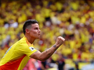 Soccer Football - World Cup - South American Qualifiers - Colombia v Argentina - Estadio Metropolitano, Barranquilla, Colombia - September 10, 2024 Colombia's James Rodriguez celebrates after Yerson Mosquera scores their first goal REUTERS/Luisa Gonzalez   TPX IMAGES OF THE DAY