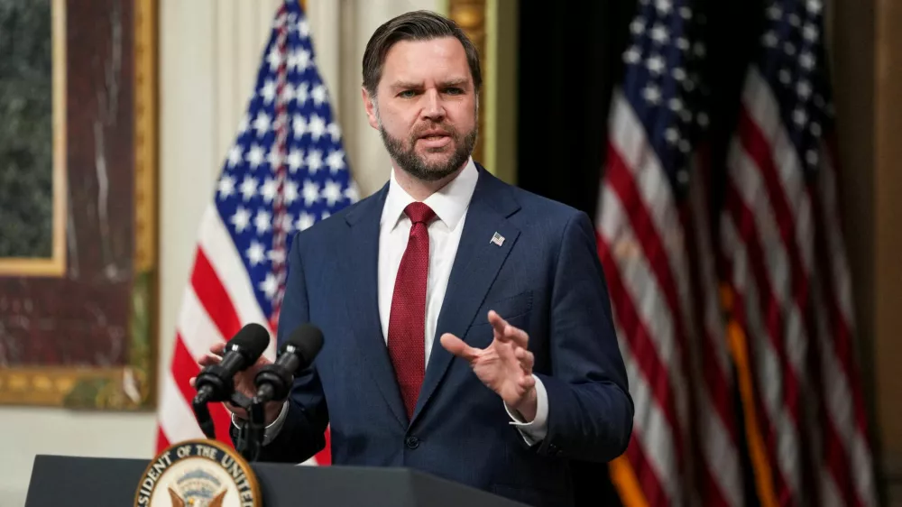 FILE PHOTO: U.S. Vice President JD Vance delivers a speech on the day he administers the oath of office to Colin McDonald, the U.S. Assistant Attorney General in charge of fraud enforcement, in the Indian Treaty Room of the Eisenhower Executive Office Building (EEOB) on the White House campus in Washington, D.C., U.S., April 1, 2026. REUTERS/Ken Cedeno/File Photo