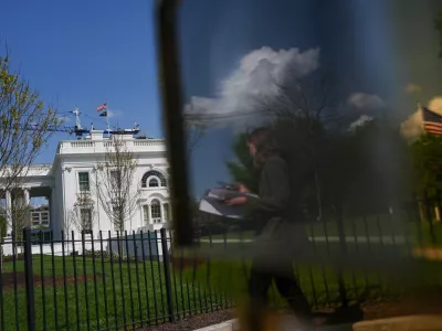Cranes being used to construct the new White House ballroom are seen around the White House, Saturday, April 4, 2026, in Washington. (AP Photo/Julia Demaree Nikhinson)