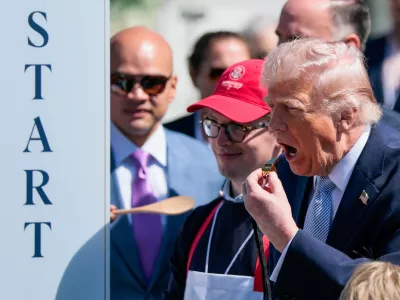U.S. President Donald Trump blows a whistle during the 2026 White House Easter Egg Roll at the White House in Washington, D.C., U.S., April 6, 2026. REUTERS/Evan Vucci