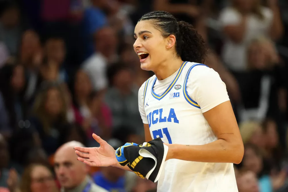 Apr 5, 2026; Phoenix, AZ, USA; UCLA Bruins center Lauren Betts (51) reacts as she heads to the bench in the fourth quarter against the South Carolina Gamecocks during the National Championship game of the women's 2026 NCAA Tournament at Mortgage Matchup Center. Mandatory Credit: Mark J. Rebilas-Imagn Images