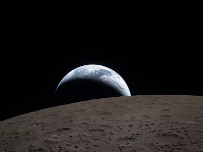 In this image provided by NASA, The Artemis II crew captured this view of an Earthset on Monday, April 6, 2026, as they flew around the Moon. (NASA via AP)