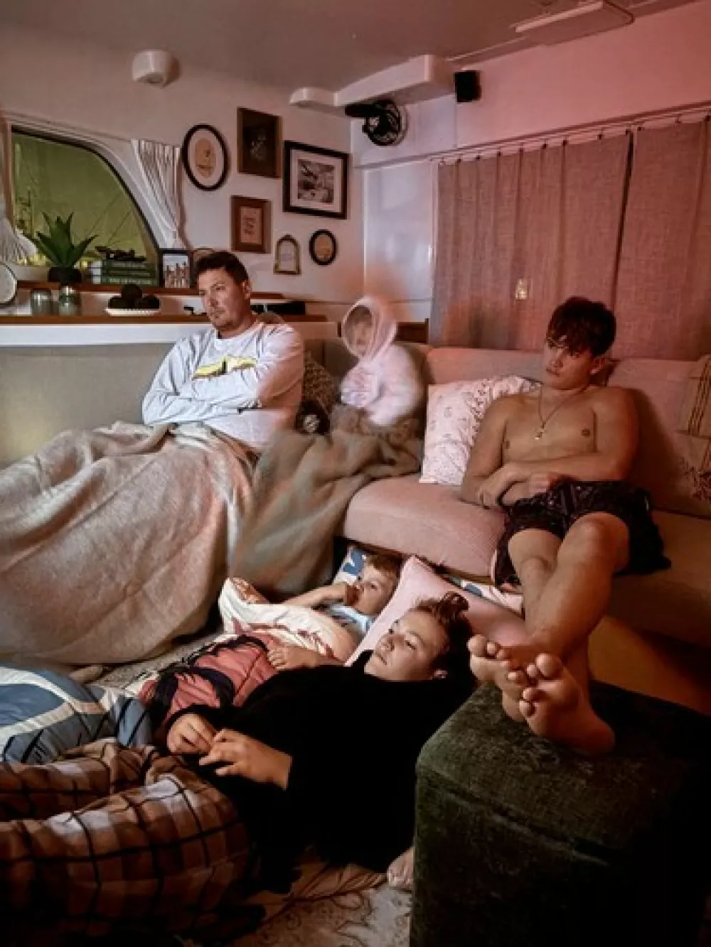 EXCLUSIVE: Story from Jam Press (Boat Life Family)'We sold our expensive house to live on a BOAT with our FOUR kids and cut our bills by 75% after watching YouTube videos&nbsp;of other families doing the same &ndash; people call us insane'A couple have shared how they sold their expensive house to live on a boat with their four kids and save thousands a month.Justin and Jen Wisdom, both 40, took the drastic step after getting fed up with the daily grind.Teacher Justin and interior designer Jen took the plunge by buying a catamaran with their four sons, Liam, 14, Langston, 13, Tavner, 11, and Tenneson, six.Despite being labelled "insane", they haven't looked back and have cut their annual bills by 75%."After almost 20 years in the same city, four kids, multiple jobs, and more moves from suburb to suburb than we can count, Justin came home one day with this wild idea, 'What if we bought a catamaran and sailed the world?'," Jen told creatorzine.com."I honestly thought he'd lost his mind."We had never sailed before, nor did we know a single person who had."But then we started watching YouTube videos of other families doing exactly that, living slower, simpler, more connected lives on the water."Little by little, what felt impossible started to feel intriguing."I could see the spark in Justin, and eventually I felt it in myself too."It was the first time in a long time we were completely on the same page, dreaming the same dream, and actually believing it might be possible."We sold everything, truly everything, except a few clothes, tools, and the essentials we knew would help us transition into boat life."In a strange way, it felt incredibly freeing."Over the years, we had accumulated this huge, mindless collection of stuff without even realising it."Letting it all go felt like hitting a reset button - simplify, start from scratch, breathe again."We loved our home and the little piece of land we had, but we didn't l.31 Mar 2026Pictured: Story from Jam Press (Boat Life Family)Pictured: L-R: Justin, Tavner, Tenneson, Langston and Liam.'We sold our expensive house to live on a BOAT with our FOUR kids and cut our bills by 75% after watching YouTube videos&nbsp;of other families doing the same &ndash; people call us insane'A couple have shared how they sold their expensive house to live on a boat with their four kids and save thousands a month.Justin and Jen Wisdom, both 40, took the drastic step after getting fed up with the daily grind.Teacher Justin and interior designer Jen took the plunge by buying a catamaran with their four sons, Liam, 14, Langston, 13, Tavner, 11, and Tenneson, six.Despite being labelled "insane", they haven't looked back and have cut their annual bills by 75%."After almost 20 years in the same city, four kids, multiple jobs, and more moves from suburb to suburb than we can count, Justin came home one day with this wild idea, 'What if we bought a catamaran and sailed the world?'," Jen told creat.,Image: 1087721855, License: Rights-managed, Restrictions: NO Australia, Germany, Norway, South Korea, Sweden, United Kingdom, United States, Unknown Country, Model Release: no, Pictured: Video grab: The Wisdom family