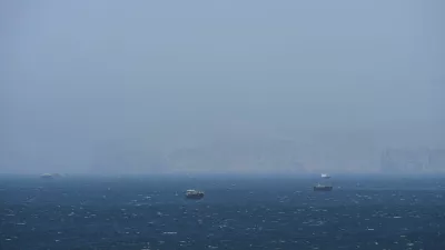 Vessels are off the coast of Musandam governorate, overlooking the strait of Hrmuz, in Musandam governance, in Oman, April 8, 2026.REUTERS/Stringer