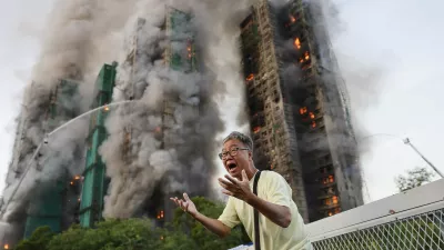 Mr Wong cries out in anguish as fire engulfs the Tai Po housing complex he calls home. Moments earlier, he phoned his wife, who was trapped in the building, and they exchanged what would be their final words. Hong Kong, 26 November 2025 Photograph: Tyrone Siu, Reuters/World Press Photo 2026