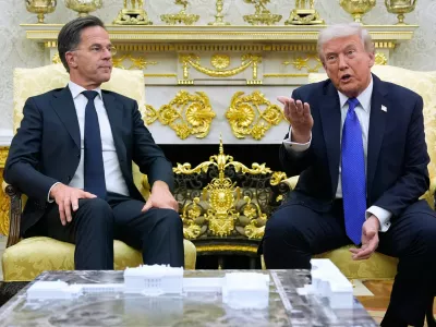 FILE - President Donald Trump meets with NATO Secretary General Mark Rutte in the Oval Office of the White House, Oct. 22, 2025, in Washington. (AP Photo/Alex Brandon, File)