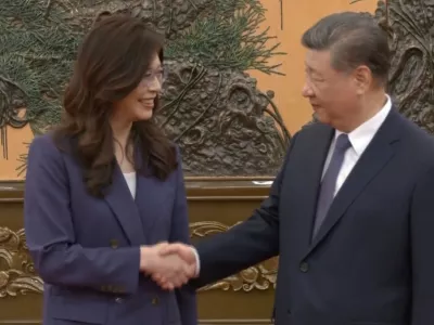 Cheng Li-wun, chairperson of the Kuomintang (KMT), Taiwan's largest opposition party, shakes hands with Chinese President Xi Jinping at the Great Hall of the People in Beijing, China April 10, 2026, in this screengrab from a video provided by CTI. CTI via REUTERS TV ATTENTION EDITORS - THIS IMAGE WAS PROVIDED BY A THIRD PARTY. TAIWAN OUT. NO RESALES. NO ARCHIVES. MANDATORY CREDIT.