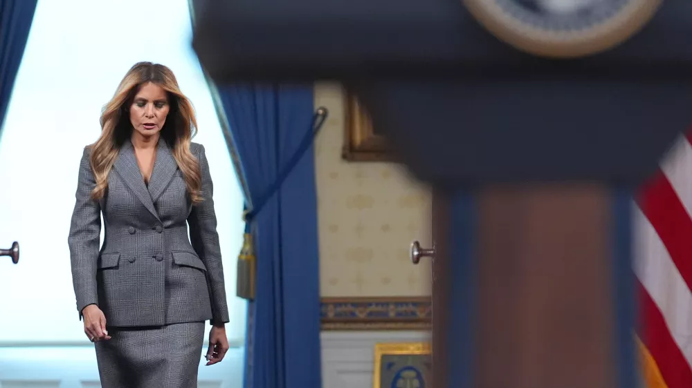 First lady Melania Trump arrives to speak with reporters Thursday, April 9, 2026, in the Grand Foyer of the White House in Washington. (AP Photo/Jacquelyn Martin)