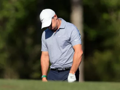 Golf - The Masters - Augusta National Golf Club, Augusta, Georgia, U.S. - April 11, 2026 Northern Ireland's Rory McIlroy reacts on the 12th hole during the third round REUTERS/Kylie Cooper   TPX IMAGES OF THE DAY
