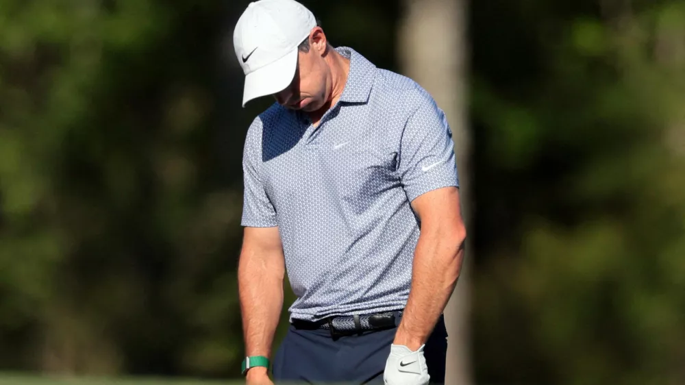 Golf - The Masters - Augusta National Golf Club, Augusta, Georgia, U.S. - April 11, 2026 Northern Ireland's Rory McIlroy reacts on the 12th hole during the third round REUTERS/Kylie Cooper   TPX IMAGES OF THE DAY
