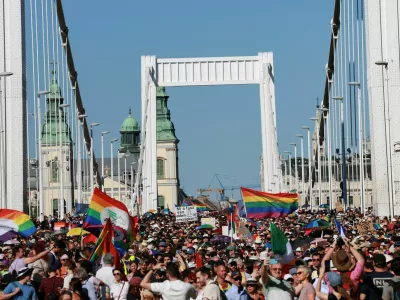 FILE PHOTO: People cross the Elisabeth Bridge during the Budapest Pride March in Budapest, Hungary, June 28, 2025. REUTERS/Bernadett Szabo/File Photo