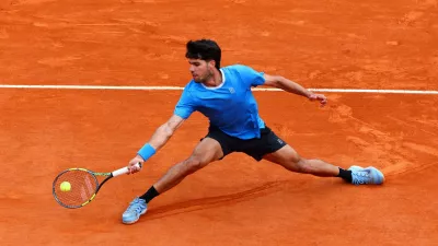 Tennis - ATP Masters 1000 - Monte Carlo Masters - Monte Carlo Country Club, Roquebrune-Cap-Martin, France - April 12, 2026 Spain's Carlos Alcaraz in action during his final match against Italy's Jannik Sinner REUTERS/Manon Cruz