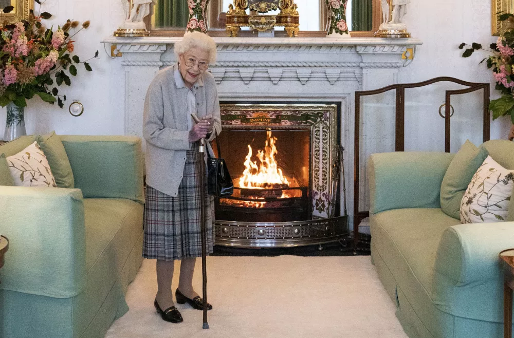 FILE - Britain's Queen Elizabeth II waits in the Drawing Room before receiving Liz Truss for an audience at Balmoral, in Scotland, Tuesday, Sept. 6, 2022, where Truss was invited to become Prime Minister and form a new government. Buckingham Palace says Queen Elizabeth II is under medical supervision as doctors are "concerned for Her Majesty's health." The announcement comes a day after the 96-year-old monarch canceled a meeting of her Privy Council and was told to rest.(Jane Barlow/Pool Photo via AP, File)