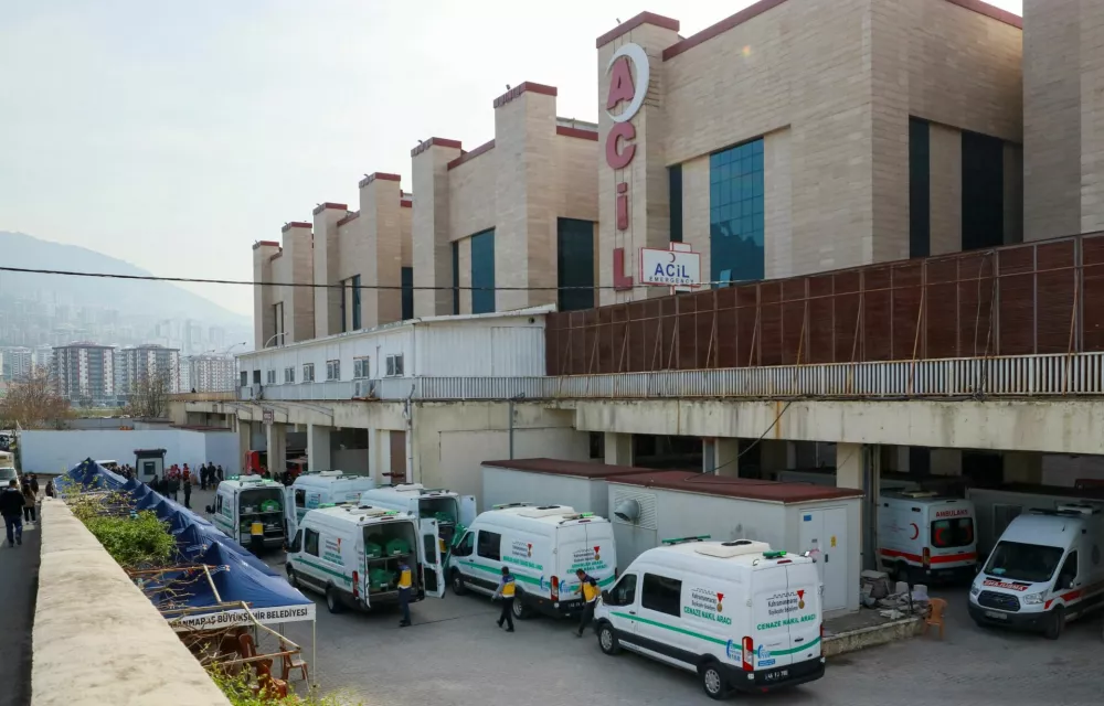 Mortuary vans are parked in front of a hospital morgue, after a deadly shooting at a school, in Kahramanmaras, Turkey, April 16, 2026. REUTERS/Ensar Ozdemir