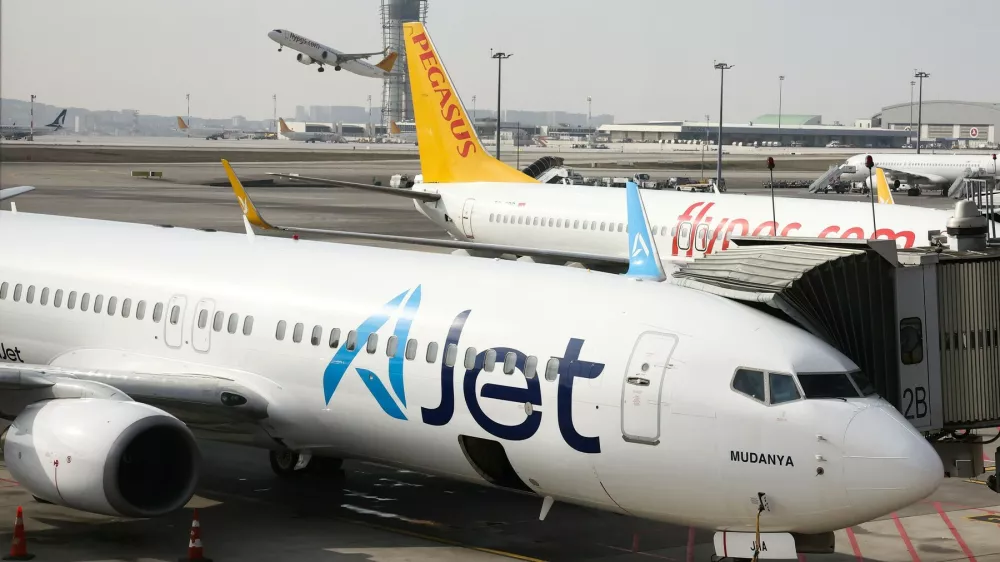 Pegasus Airlines and AJet planes is seen at Sabiha Gokcen International Airport in Istanbul, Turkiye on March 1, 2025.Turkish Budget Airlines, Istanbul, Turkey - 01 Mar 2025,Image: 971604570, License: Rights-managed, Restrictions:, Model Release: no