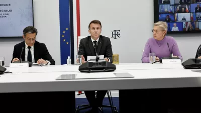 French President Emmanuel Macron, Martin Ajdari, Chairman of Arcom, the French regulatory authority for audiovisual and digital communication, and French Junior Minister for Artificial Intelligence (AI) and Digital Technology Anne Le Henanff attend a video conference meeting dedicated to national and European initiatives aimed at establishing a digital majority to access social networks, at the Elysee Palace in Paris, France, April 16, 2026. REUTERS/Benoit Tessier/Pool
