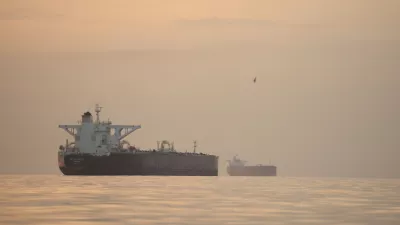 Tankers anchored in the Strait of Hormuz off the coast of Qeshm Island, Iran, Saturday, April 18, 2026. (AP Photo/Asghar Besharati)