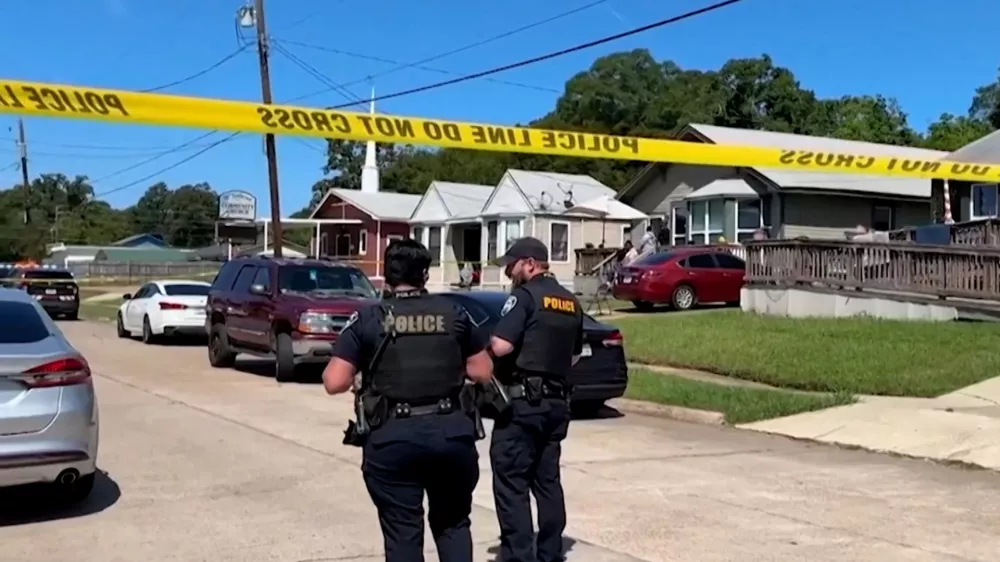 Police officers secure a street where eight children, with ages ranging from 1 to 14, were killed in a mass shooting in Shreveport, Louisiana, U.S. April 19, 2026, in a still image from video. ABC Affiliate KTBS via REUTERS/Handout via REUTERS  THIS IMAGE HAS BEEN SUPPLIED BY A THIRD PARTY. NO RESALES. NO ARCHIVES.