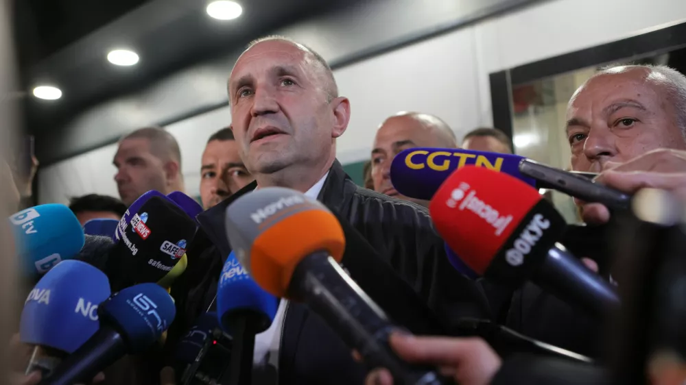 Former Bulgarian President Rumen Radev speaks to journalists after the polls closed in Sunday's election, in Sofia, Bulgaria, April 19, 2026. (AP Photo/Valentina Petrova)