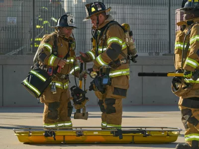 Firefighters respond to a simulated train fire during an Emergency Response Drill and training exercise at the NJ Transit Meadowlands Rail Line at MetLife Stadium, ahead of the FIFA World Cup 2026, in East Rutherford, New Jersey, U.S., April 18, 2026. REUTERS/Bing Guan