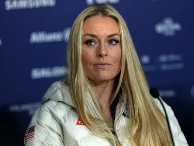 United States' Lindsey Vonn attends a press conference by the U.S. ski team at the 2026 Winter Olympics, in Cortina d'Ampezzo, Italy, Tuesday, Feb. 3, 2026. (AP Photo/Fatima Shbair)