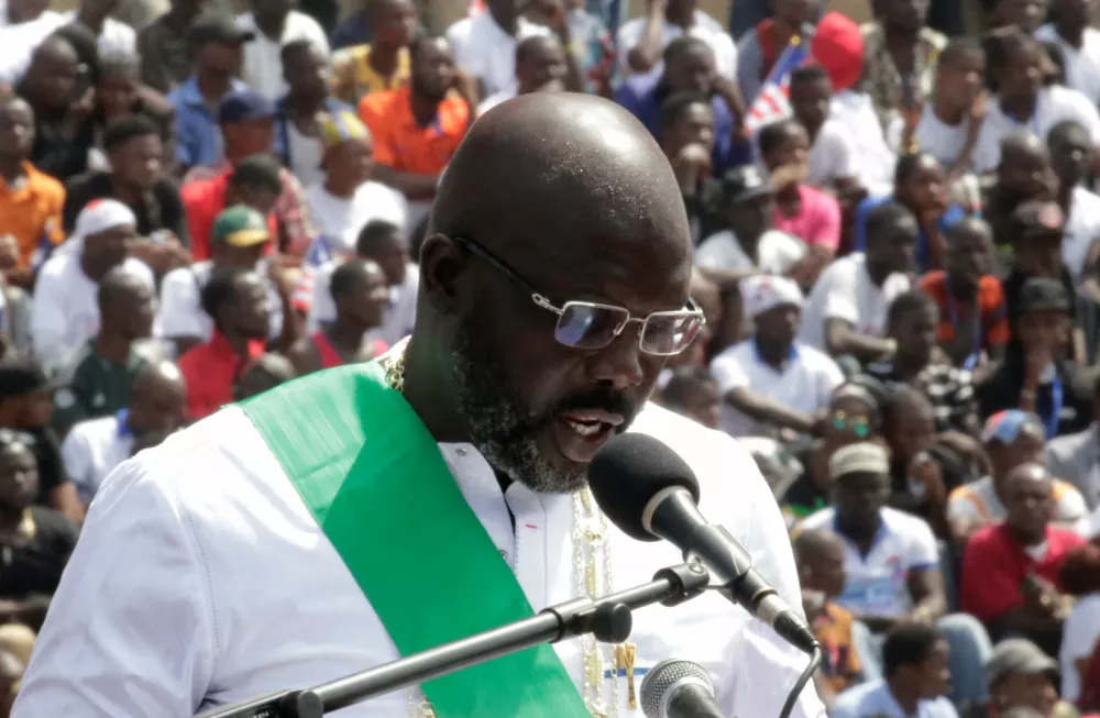 Liberia's President George Weah speaks during his swearing-in ceremony at the Samuel Kanyon Doe Sports Complex in Monrovia, Liberia, January 22, 2018. REUTERS/Thierry Gouegnon / Foto: Thierry Gouegnon
