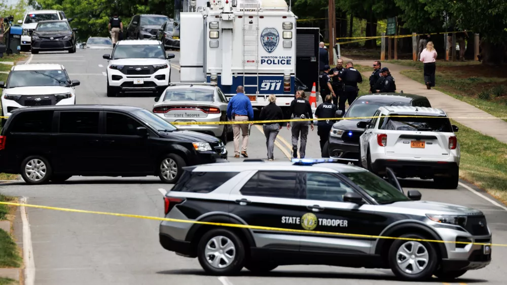 Winston-Salem police have a mobile command unit set up at the scene of a shooting at Leinbach Park, Monday, April 20, 2026, in Winston-Salem, N.C. (Allison Lee Isley/The Winston-Salem Journal via AP)