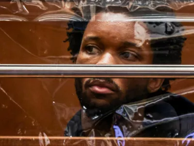 Singer David Anthony Burke, known as D4vd, looks on during his arraignment for the murder of Celeste Rivas Hernandez at the Clara Shortridge Foltz Criminal Justice Center in Los Angeles, California, U.S., April 20, 2026. Los Angeles County District Attorney Nathan J. Hochman announced earlier in the day that musician David Anthony Burke, known as D4vd, was charged today with murdering 14-year-old Celeste Rivas Hernandez, whose body was found decomposed and dismembered in his car that had been impounded in September 2025.  TED SOQUI/Pool via REUTERS