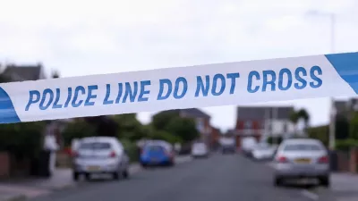 FILE PHOTO: Police tape outlines a perimeter, in Maple street, near a tribute for the victims of a knife attack in Southport, Britain, August 2, 2024. REUTERS/Manon Cruz/File Photo
