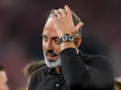 Real Sociedad's head coach Pellegrino Matarazzo celebrates after winning the Copa del Rey final soccer match between Atletico Madrid and Real Sociedad in Seville, Spain, Saturday, April. 18, 2026. (AP Photo/Jose Breton)