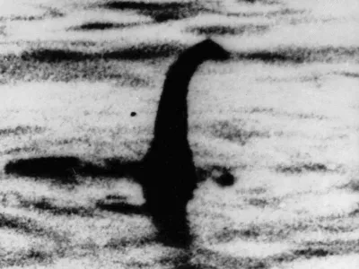 FILE - This undated file photo shows a shadowy shape that some people say is a the Loch Ness monster in Scotland. On Thursday, Sept. 5, 2019, scientist Neil Gemmell from the University of Otago in New Zealand says a project found a surprisingly high amount of eel DNA in the water. He cautioned that it&acirc;&euro;&trade;s not clear whether that indicates a gigantic eel or just a lot of little ones. (AP Photo/File)