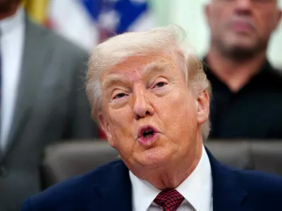 FILE PHOTO: U.S. President Donald Trump speaks about research into mental health treatments in the Oval Office of the White House in Washington, D.C., April 18, 2026. REUTERS/Nathan Howard/File Photo