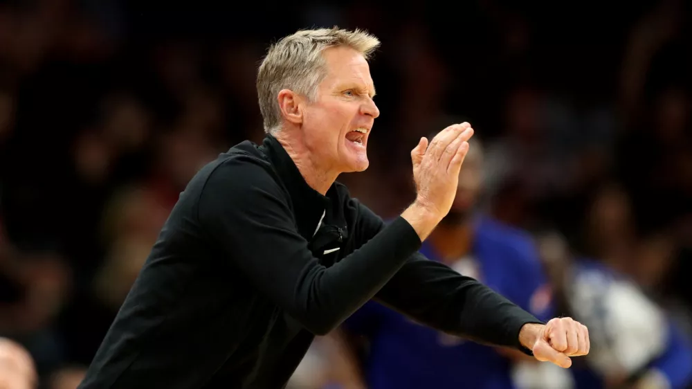 FILE PHOTO: Nov 30, 2021; Phoenix, Arizona, USA; Golden State Warriors head coach Steve Kerr reacts against the Phoenix Suns at Footprint Center. Mandatory Credit: Mark J. Rebilas-USA TODAY Sports/File Photo