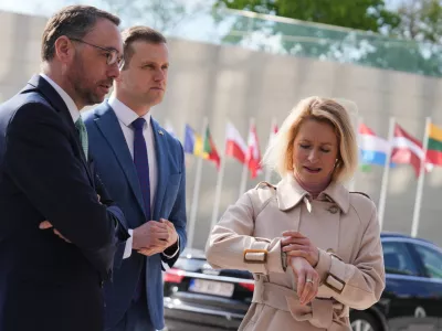 European Union foreign policy chief Kaja Kallas, right, looks at her watch as she arrives for a meeting of EU foreign ministers at the European Council building in Luxembourg, Tuesday, April 21, 2026. (AP Photo/Virginia Mayo)