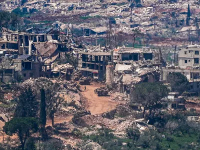 Israeli military vehicles and soldiers in a village in southern Lebanon as the Israeli army operates in it as seen from the Israeli side of the border, April 23, 2026 REUTERS/Ayal Margolin ISRAEL OUT. NO COMMERCIAL OR EDITORIAL SALES IN ISRAEL