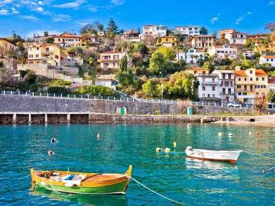 Ika village waterfront in Opatija riviera, turquoise sea and blue sky, Kvarner, Croatia