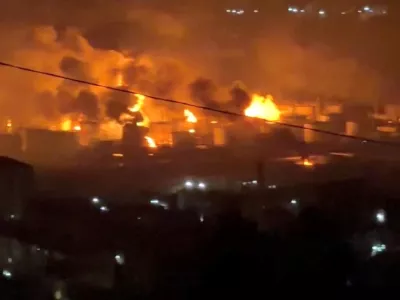 FILE PHOTO: Fire and smoke rise at the Tuapse oil refinery near the Tuapse port, following a Ukrainian drone attack, according to Russian officials, in Tuapse, Krasnodar Krai, Russia, in this screengrab obtained from a social media video released on April 20, 2026. SOCIAL MEDIA/via REUTERS THIS IMAGE HAS BEEN SUPPLIED BY A THIRD PARTY. NO RESALES. NO ARCHIVES. NEWS USE ONLY.  VERIFICATION: - Reuters was able to confirm the location from the position of buildings and road layout, which matched the file and satellite imagery of the area. - Date not verified, but local governor Veniamin Kondratiev said on Monday (April 20) that one man has died and another has been injured in a "massive" Ukrainian drone attack on Russia's Black Sea port of Tuapse. - NASA FIRMS (NASA's Global Fire Tracking Map) detected thermal activity in the area in the past 24 hours. No older version of the video was found posted online before April 20./File Photo/File Photo