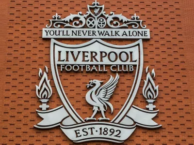 One of the two giant silver crests of Liverpool FC pictured on the new main stand. This crest has been used by the club since 1999 & features the Liver Bird, the Shankly Gates & two eternal flames to remember the victims of the Hillsborough disaster.,Image: 312909563, License: Royalty-free, Restrictions:, Model Release: no
